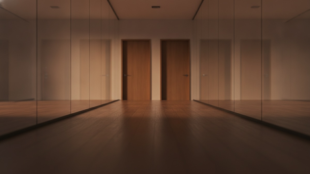 An empty glass-walled office corridor at dusk with two unmarked doors at the far end and no signage on the walls